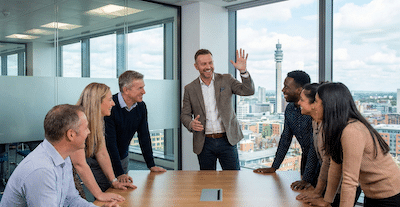 A dynamic shot of a charismatic business leader in the middle of a passionate presentation to their team